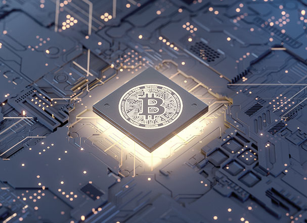 illustration of chip with shiny gold Bitcoin logo stamped on it