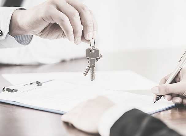 What is the tax triggering event for real estate transfer tax?