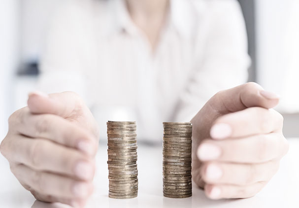 Two stacks of coins of the same size on a table